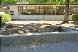 Calaveras Hall detention basin with porous pavement